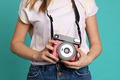 Young woman with instant camera - PhotoDune Item for Sale