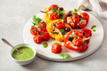 stuffed bell peppers with quinoa tomatoes olives and herb sauce chimichurri - PhotoDune Item for Sale