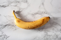 ripe overripe organic bananas on concrete background. ugly food zero waste concept - PhotoDune Item for Sale
