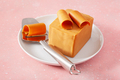 Norwegian brunost traditional brown cheese block and slicer - PhotoDune Item for Sale