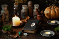 Witchcraft still life concept with potion, spell book, herbs ingredients and magical equipment - PhotoDune Item for Sale