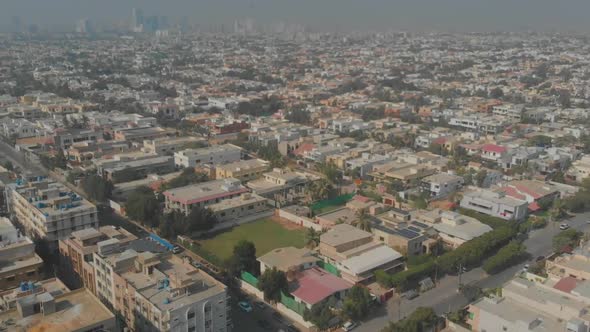 Aerial Over Neighbourhood Of Clifton Cantonment In Karachi, Pakistan. Tracking Shot