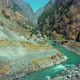 Beautiful Bhagirathi river flowing through stones under the bridge near the bank of Highway road - VideoHive Item for Sale