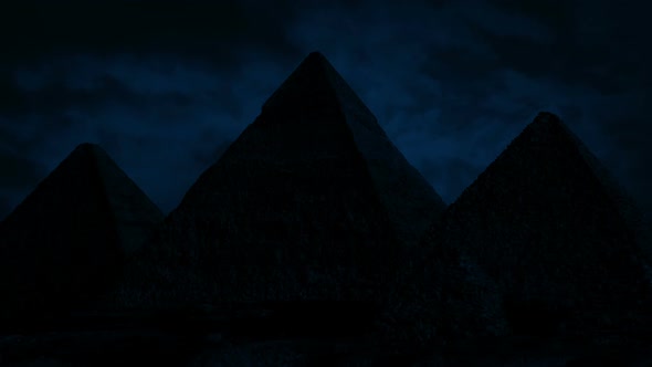 Pyramids In The Desert At Night