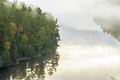 High angle view of boundary waters lake and trees in morning fog in northern Minnesota during autumn - PhotoDune Item for Sale