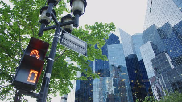 Lamp post near modern buildings