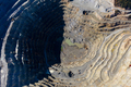 Flying above an open pit mine, copper excavation in Rosia Poieni, Romania. Aerial view - PhotoDune Item for Sale