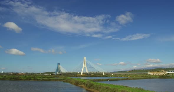 Bridge and sky in Portimão, Algarve Portugal, over saline drip