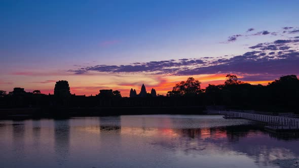 Sunrise time lapse at Angkor Wat main facade silhouette. World famous temple in Cambodia