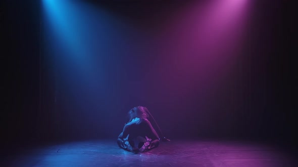 Young Adult Woman Showing Erotic Dancing Style in Studio. Strip Plastic. Black Silhouette. Slow