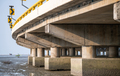 Structure of reinforced concrete bridge along sea. Bottom view of concrete bridge. Concrete bridge - PhotoDune Item for Sale