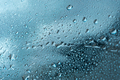 Abstract background with raindrops and beautiful blue bokeh - PhotoDune Item for Sale