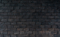 Black and brown brick wall rough texture background with space for text. Background for death, sad - PhotoDune Item for Sale