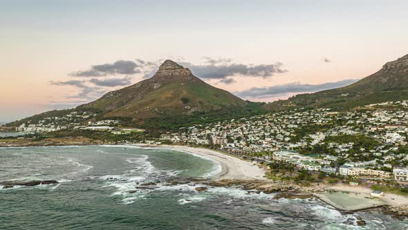 Water in Sea Bay Washing Sand Beach Residential Buildings in Tourist Destination on Seaside