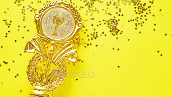 Champion gold cup trophy on yellow background. minimalism style