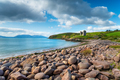The ancient ruins of Minard Castle overlooking Kilmurry Bay - PhotoDune Item for Sale