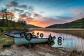 Beautiful sunrise over boats at Glencar Lough - PhotoDune Item for Sale