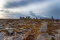 Deirbhile's Twist a modern stone circle under a stormy sky - PhotoDune Item for Sale