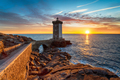 Sunset over the Lighthouse at Kermorvan - PhotoDune Item for Sale