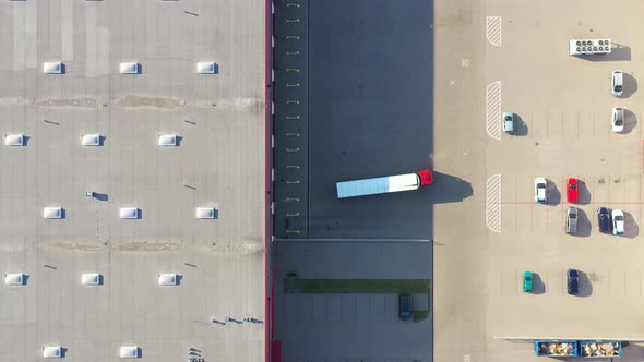 Aerial View of Loading Warehouse with Semi Truck. Aerial