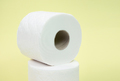 White toilet paper roll on neutral  background - PhotoDune Item for Sale