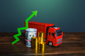 Truck and green up arrow. Growing profits from transport industry. - PhotoDune Item for Sale