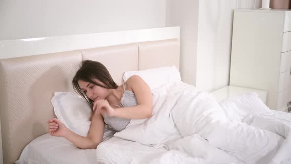 Blogger Recording Vlog Video on Smartphone Waking Up in Bed