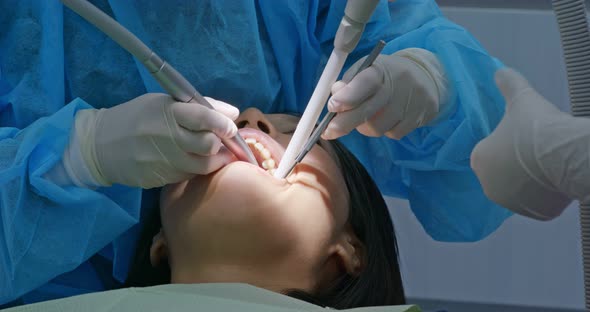 Woman have dental check up in the clinic