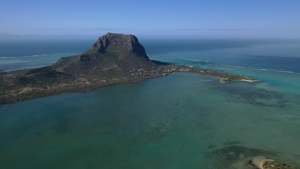 Beautiful Bird's-eye View of Mount Le Morne Brabant and the Waves of the Indian Ocean in Mauritius