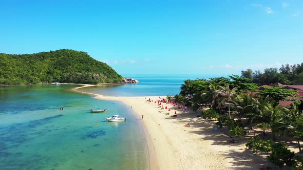 Natural above clean view of a sunshine white sandy paradise beach and blue ocean background in colou