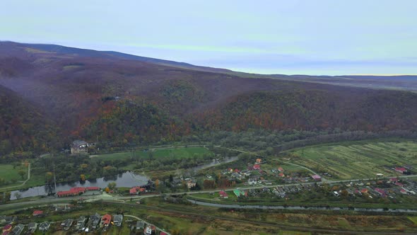 Aerial View of Panoramic Beautiful Landscape with Mountain Scenery and Autumn Forest