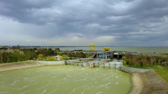 View From Above of the Water Rushing Through the Gates of the Dam at the Krasnodar Reservoir