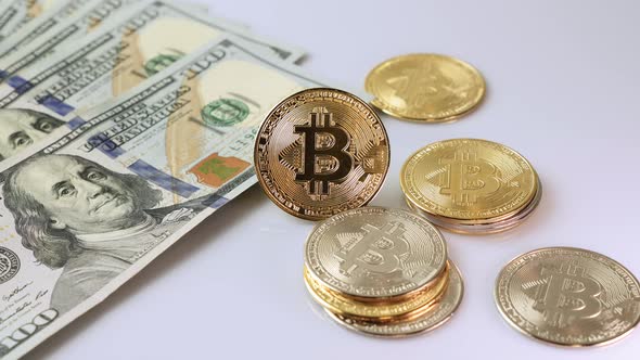 Bitcoin and money on white background.