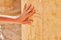 Image of hand touching Egyptian hieroglyphs in Mortuary Temple of Hatshepsut - PhotoDune Item for Sale