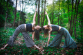 Sports yoga poses by a couple of girls - PhotoDune Item for Sale