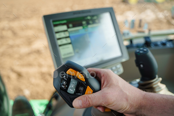 A farmer using precision agriculture and other modern farming techniques to improve agricultural