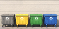 Garbage containers with separated garbage on a street - PhotoDune Item for Sale