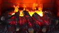 Close up of electric fireplace with orange and yellow fire flame. - PhotoDune Item for Sale