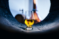 A glass of whiskey in oak barrel - PhotoDune Item for Sale