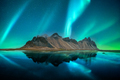 Aurora borealis Northern lights over famous Stokksnes mountains - PhotoDune Item for Sale