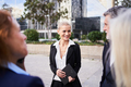 A business woman meeting with her colleagues outside office building - PhotoDune Item for Sale