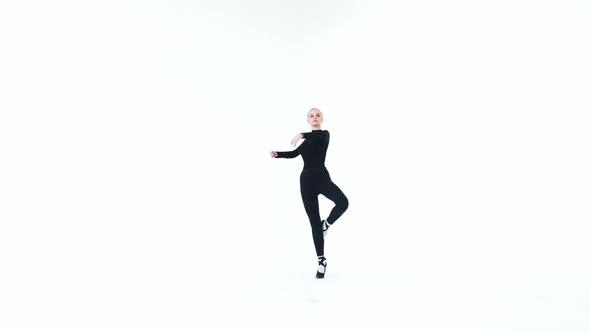 Ballerina  Young Blonde Woman Spinning Around in the Studio