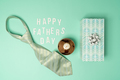 Father's Day poster with tie, watch and gift box on mint background - PhotoDune Item for Sale
