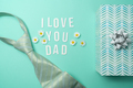 Father's day poster with tie and gift box on mint background - PhotoDune Item for Sale