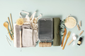 Set of eco-friendly tableware and cleaning products on pastel blue background, flat lay - PhotoDune Item for Sale
