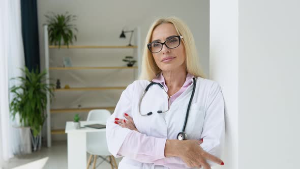 Female Physician Posing in Hospital Office