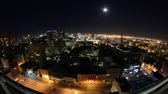 Time lapse at night of the skyline of cape town, south africa. Rooftop panorama shot. Super wide sho