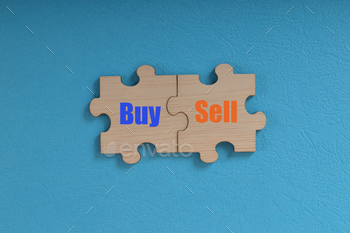Wooden jigsaw puzzle with text BUY and SELL.
