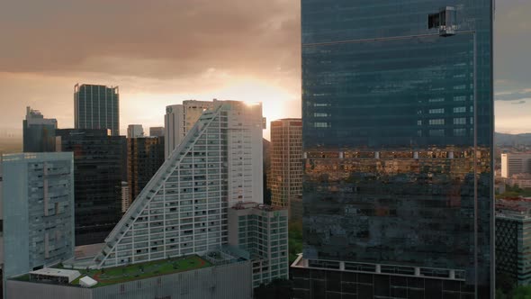 Cinematic View on Sunset Light and Golden Clouds Over the Modern Mexico District