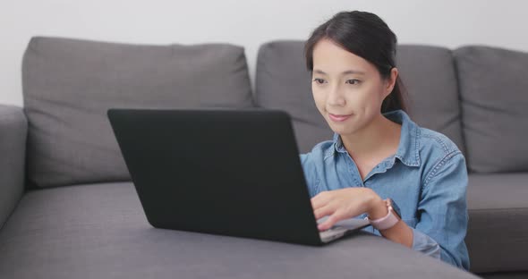 Woman Working on Laptop Computer